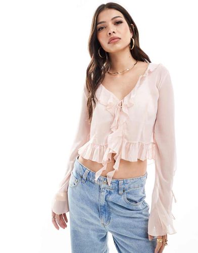 Top pallido trasparente con volant - Bershka - Modalova