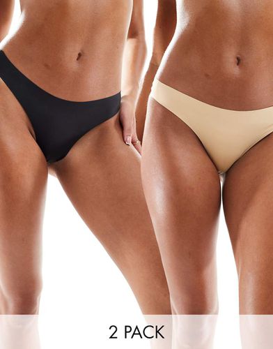 Confezione da 2 paia di slip brasiliana invisibili sotto i vestiti effetto levigante color nero e beige - Bye Bra - Modalova