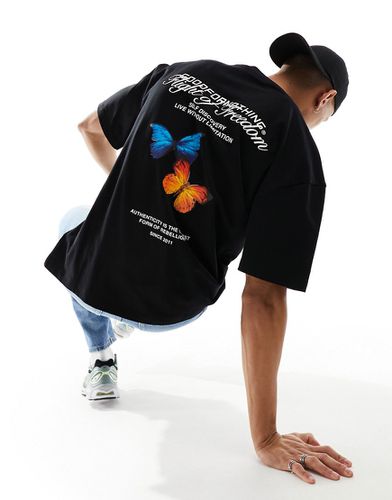 T-shirt oversize nera con stampa di farfalle - Good For Nothing - Modalova