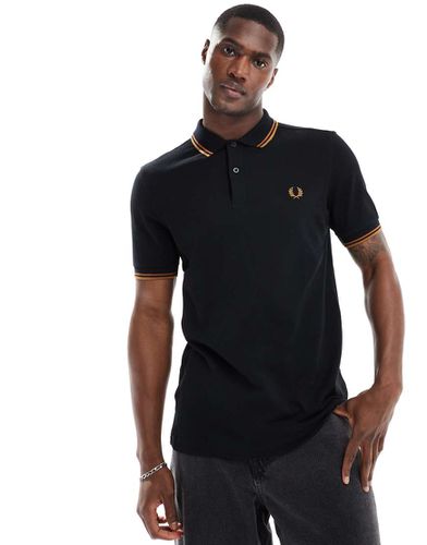 Polo nera con righe doppie a contrasto su maniche e colletto - Fred Perry - Modalova