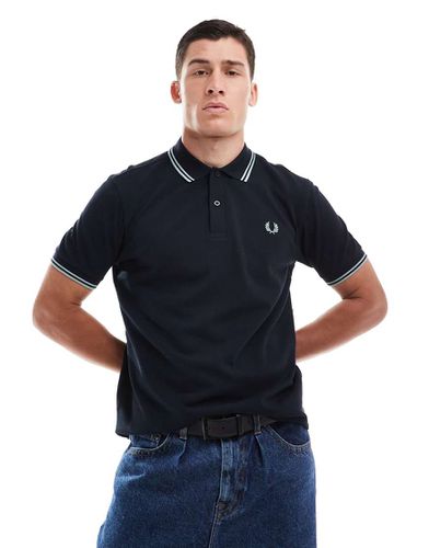 Polo nera con righe doppie a contrasto su maniche e colletto - Fred Perry - Modalova