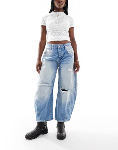 Jeans bombati slavato con strappi - Free People - Modalova