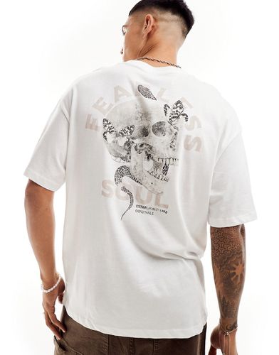T-shirt oversize bianca con stampa di teschio sul retro - Jack & Jones - Modalova