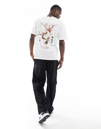 T-shirt oversize bianca con stampa sul retro di ciliegio in fiore - Jack & Jones - Modalova