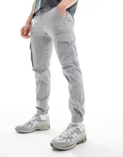 Pantaloni cargo con fondo elasticizzato chiaro - Jack & Jones - Modalova