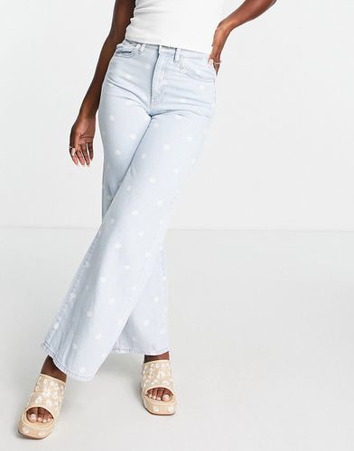 Jeans a fondo ampio lavaggio chiaro con stampa margherite - ONLY - Modalova