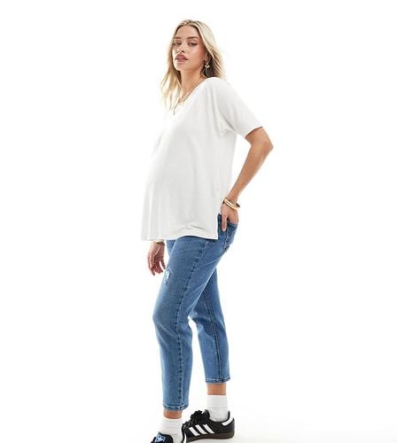 Mom jeans a vita alta azzurri con strappi - Only Maternity - Modalova