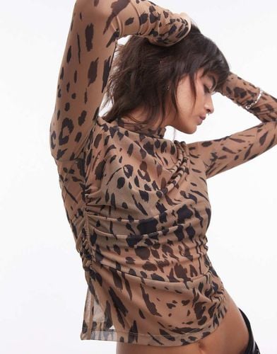 Top in rete a maniche lunghe con stampa leopardata - Other Stories - Modalova