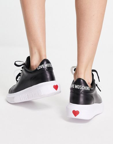 Sneakers nere con plateau e motivo a cuore - Love Moschino - Modalova