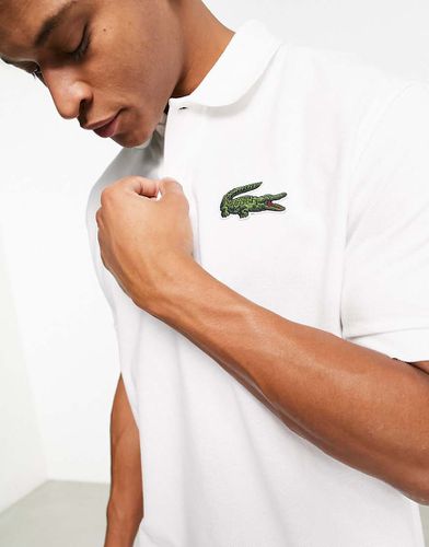 Polo ampia bianca con logo grande - Lacoste - Modalova