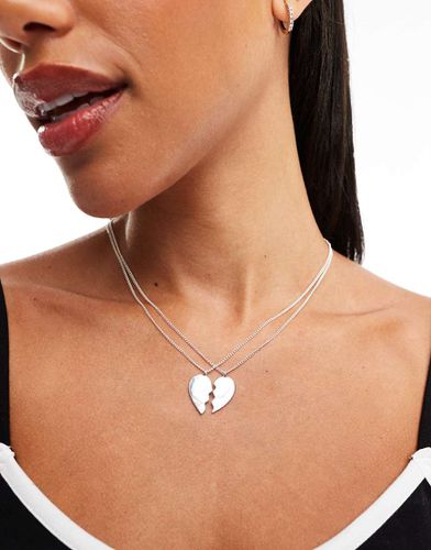 Collana argentata con cuore a metà - Monki - Modalova