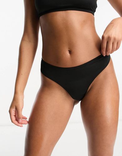 Slip bikini stile perizoma nero in coordinato - Monki - Modalova