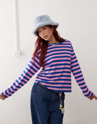 Top a maniche lunghe a righe blu e rosa - Monki - Modalova