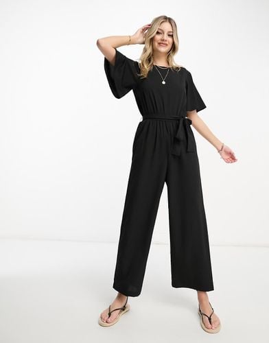 Tuta jumpsuit nera allacciata in vita con maniche con volant - Monki - Modalova