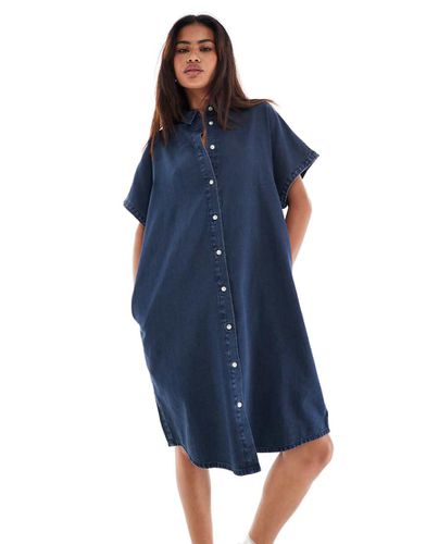 Vestito camicia corto in denim lavaggio medio - Monki - Modalova