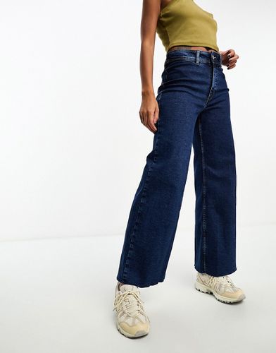 Jeans a zampa taglio corto scuro a vita alta - Mango - Modalova