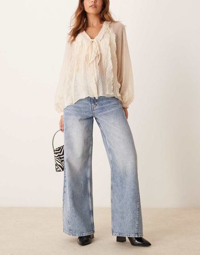 Jeans con fondo ampio lavaggio acido - Miss Selfridge - Modalova