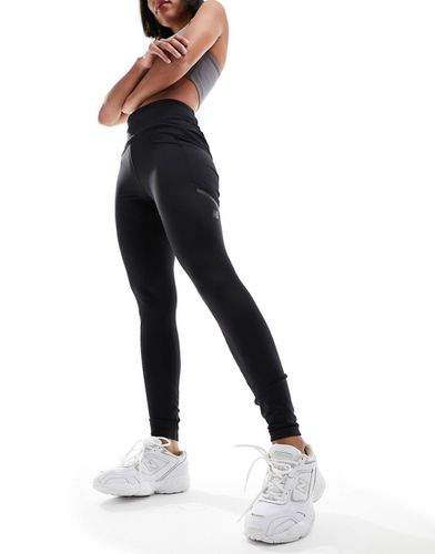 Impact Run Heat - Leggings neri - New Balance - Modalova