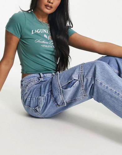 Jeans cargo a fondo ampio lavaggio - New Look - Modalova