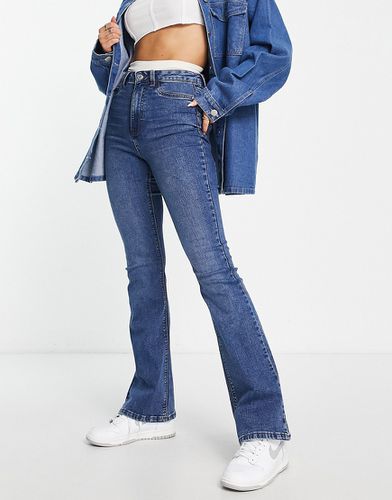 Jeans bootcut a zampa medio, a vita alta - New Look - Modalova