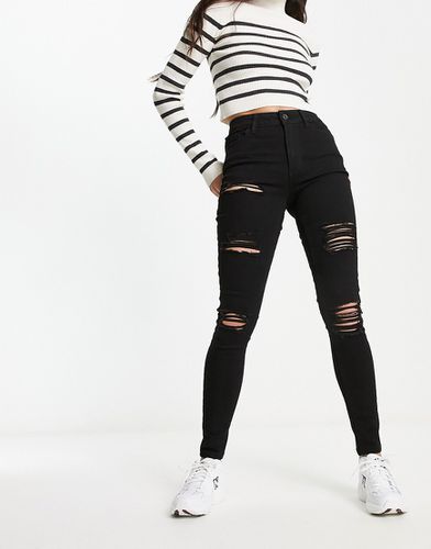 Jeans skinny strappati neri - New Look - Modalova