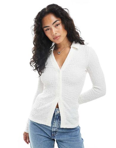 Top texturé à boutonnage - Crème - New Look - Modalova