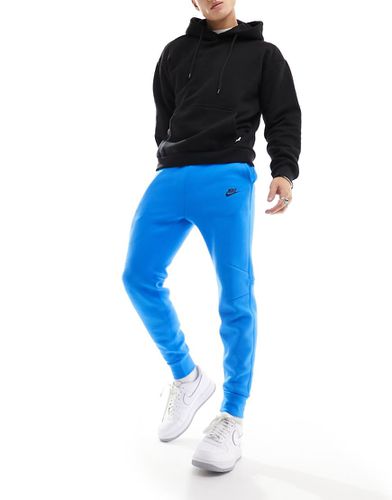 Nike Tech - Joggers in pile blu - Nike - Modalova