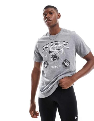 T-shirt scuro con stampa "Bulldog" - Nike Training - Modalova