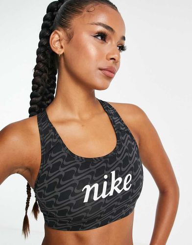 Icon Clash Swoosh AOP - Reggiseno sportivo a supporto medio con grafica stampata del logo - Nike Training - Modalova