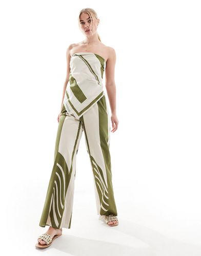 Pantaloni a fondo ampio verdi e bianchi con righe a contrasto in coordinato - SNDYS - Modalova