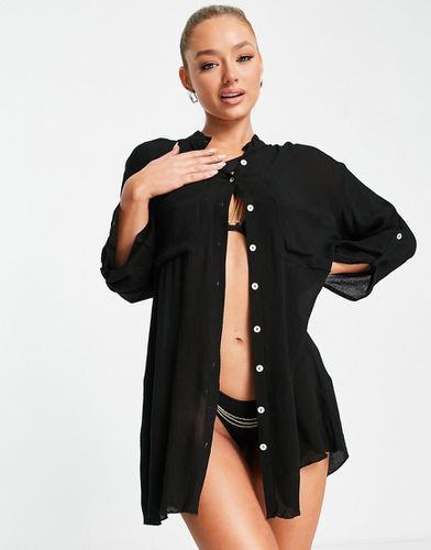 Camicia da mare oversize nera con due tasche - South Beach - Modalova