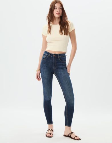 D07 - Jean skinny à taille standard - délavé - Stradivarius - Modalova