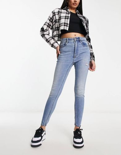 Jeans skinny a vita alta medio - Stradivarius - Modalova