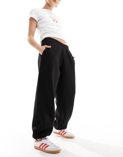 Joggers neri sportivi larghi - Stradivarius - Modalova