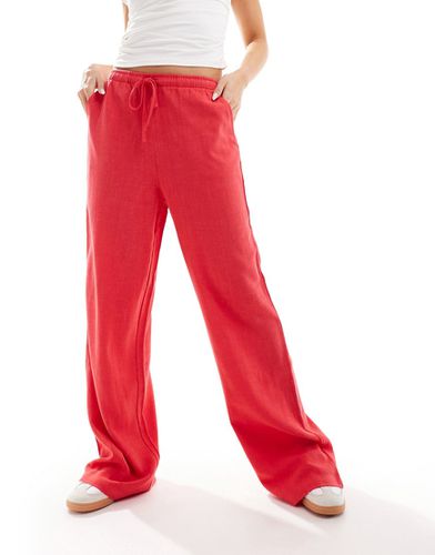 Pantaloni in misto lino rossi - Stradivarius - Modalova