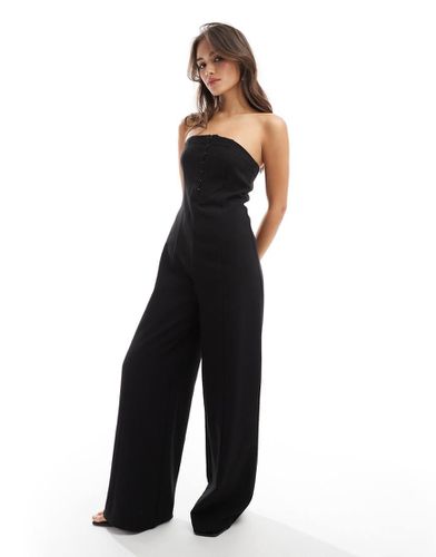 Tuta jumpsuit sartoriale a fascia con fondo ampio nera - Pimkie - Modalova