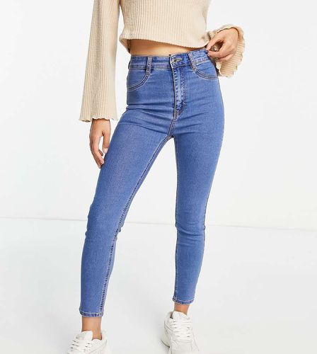 Petite - Jeans super skinny a vita alta medio - Pull & Bear - Modalova