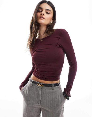 Top in poliammide bordeaux a maniche lunghe con schiena scoperta - Pull & Bear - Modalova