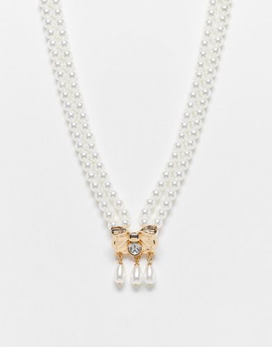 Collana in perle con pendente a fiocco color oro - Reclaimed Vintage - Modalova