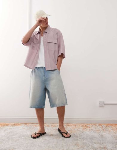 Bermuda long oversize en jean - clair délavé - Reclaimed Vintage - Modalova