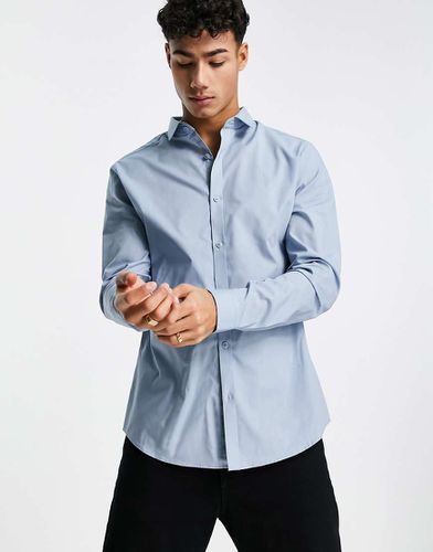 Camicia a maniche lunghe elegante da lavoro in popeline blu - River Island - Modalova