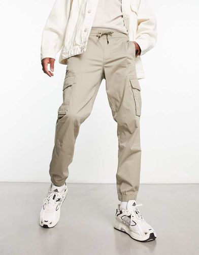 Pantaloni cargo beige slavato - River Island - Modalova