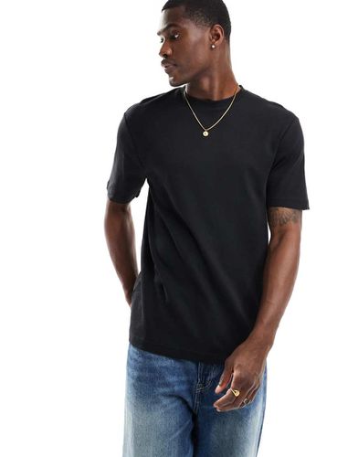 Studio - T-shirt slim fit nera - River Island - Modalova