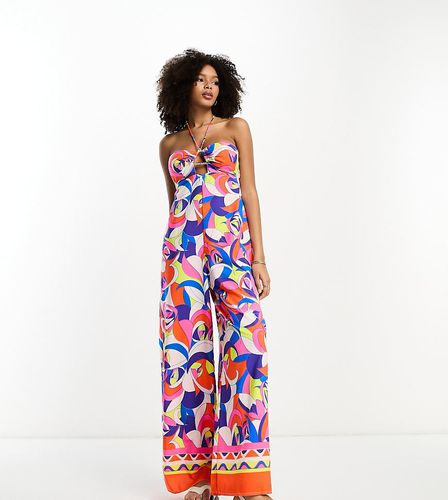 Tuta jumpsuit a fascia acceso con stampa astratta - River Island - Modalova