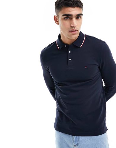 Polo slim fit a maniche lunghe nera con righe a contrasto sui bordi - Tommy Hilfiger - Modalova