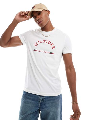 T-shirt bianca con logo ad arco - Tommy Hilfiger - Modalova