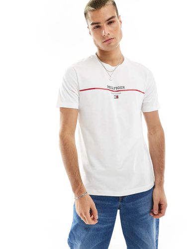 T-shirt bianca con logo e righe - Tommy Hilfiger - Modalova