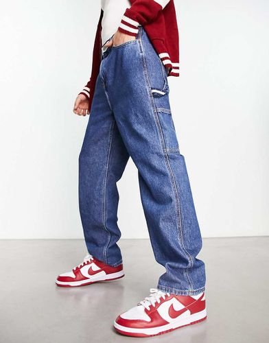 Jeans skater affusolati in cotone lavaggio medio - Tommy Jeans - Modalova