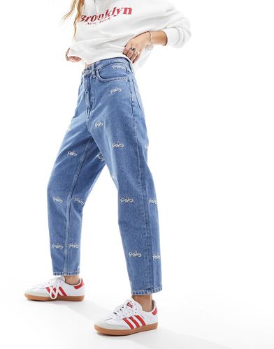 Mom jeans affusolati a vita super alta lavaggio medio - Tommy Jeans - Modalova