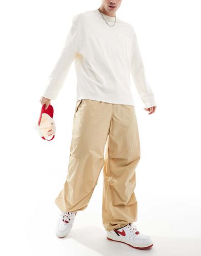 Pantaloni beige in nylon stile paracadutista - Tommy Jeans - Modalova